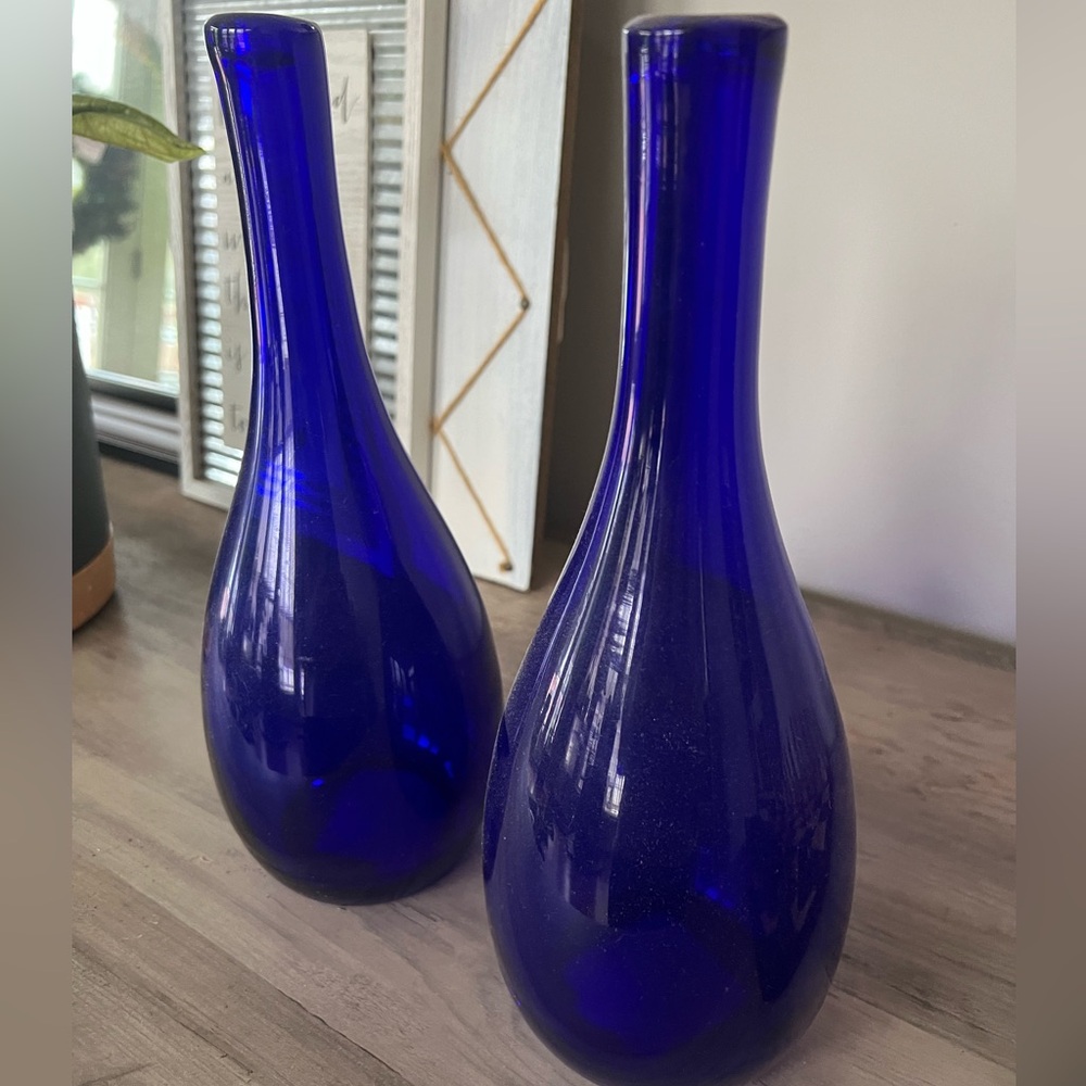 2 Blue glass vases used for decor
